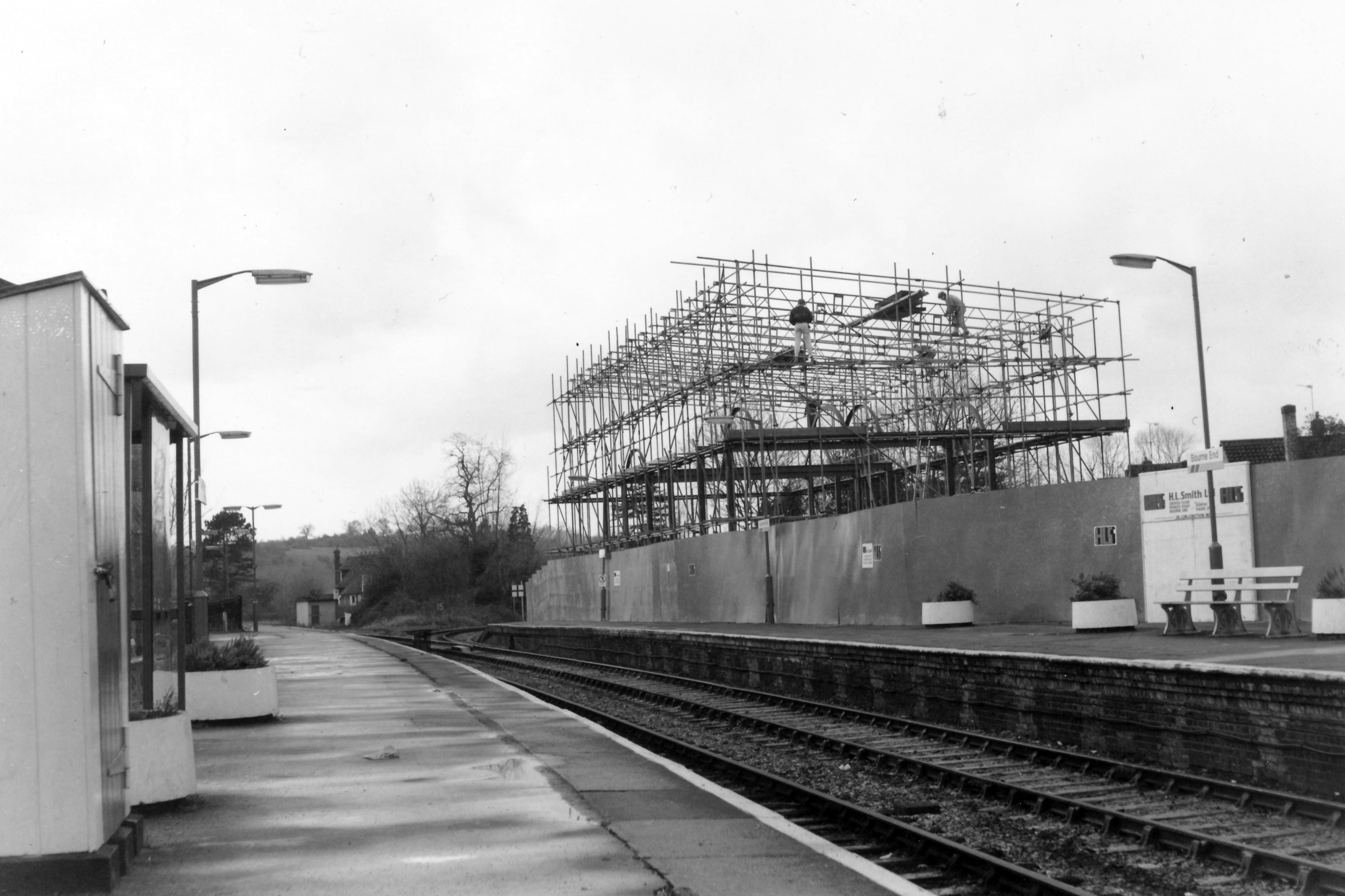 scaffolding being erected around the framework for a new offce building being erected on the site of the Marlow bay at Bourne End.